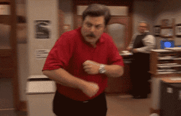 Gif of Ron Swanson from Parks and Recs dancing 