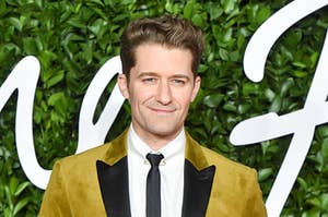 Matthew Morrison smiling at a press event