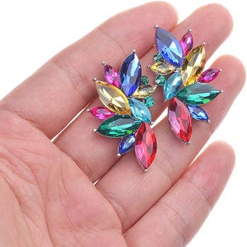 The earrings in rainbow jewels