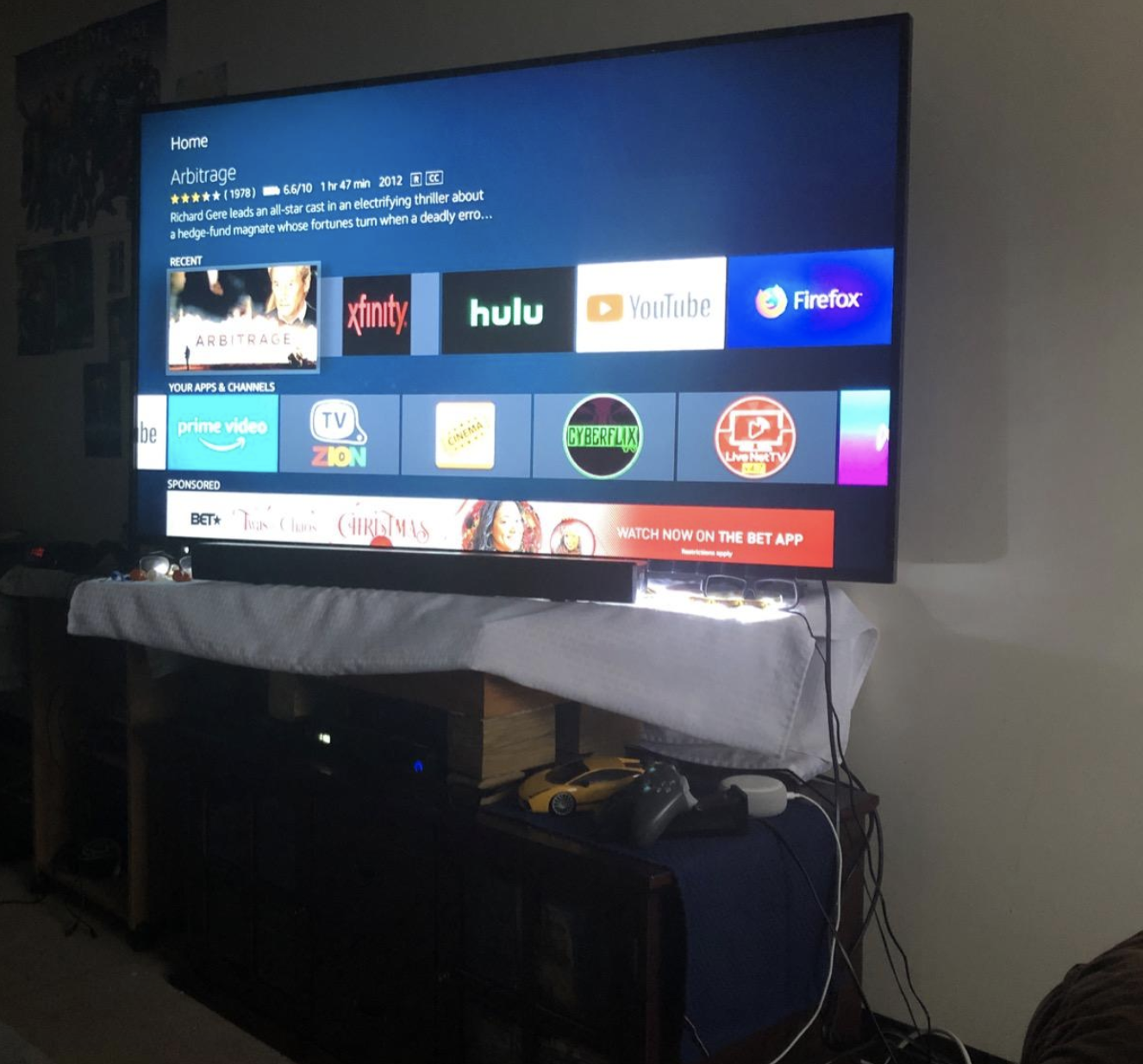 various streaming app options on a tv screen with fire stick plugged in