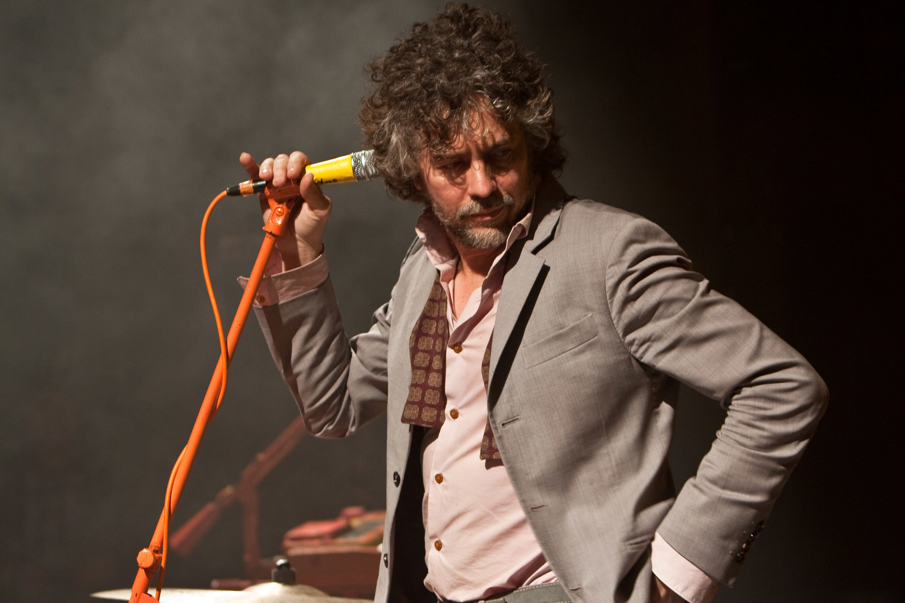 A photo of Wayne Coyne of the Flaming Lips on stage at Myspace Secret Show