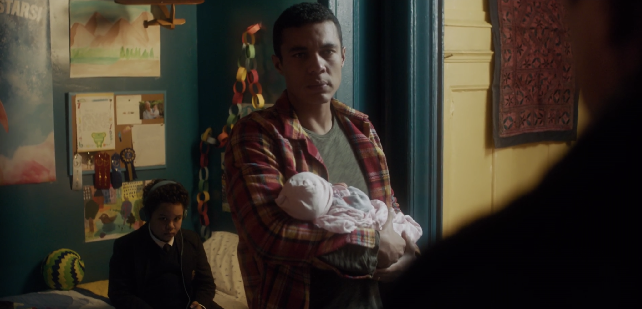 Fernando holding the baby.