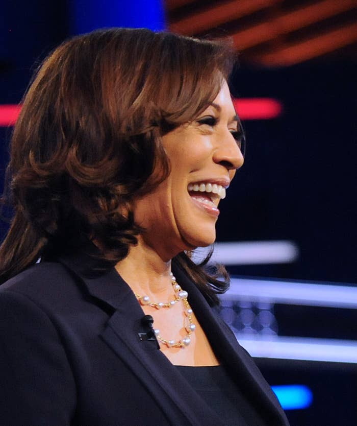 Kamala Harris smiling and looking to the right.