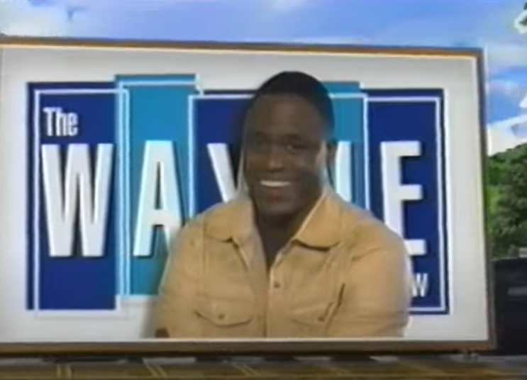 A screen grab of Wayne on a billboard from the show&#x27;s intro