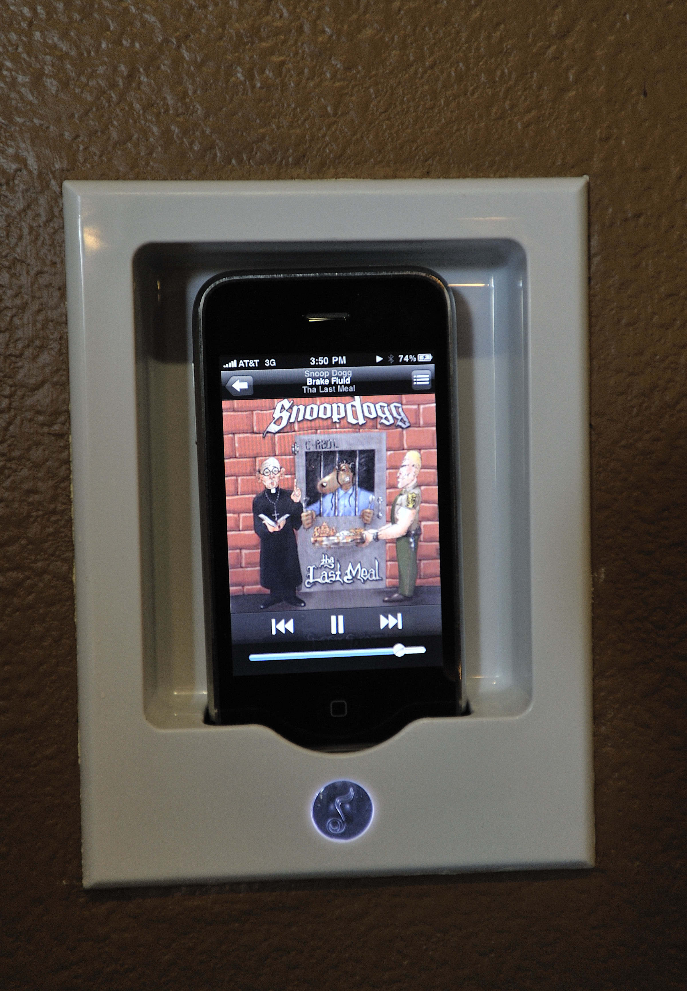 An iPod touch in a wall duck playing Snoop Dogg