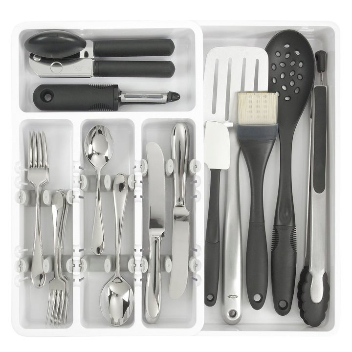 White utensil organizer with gray plastic dividers