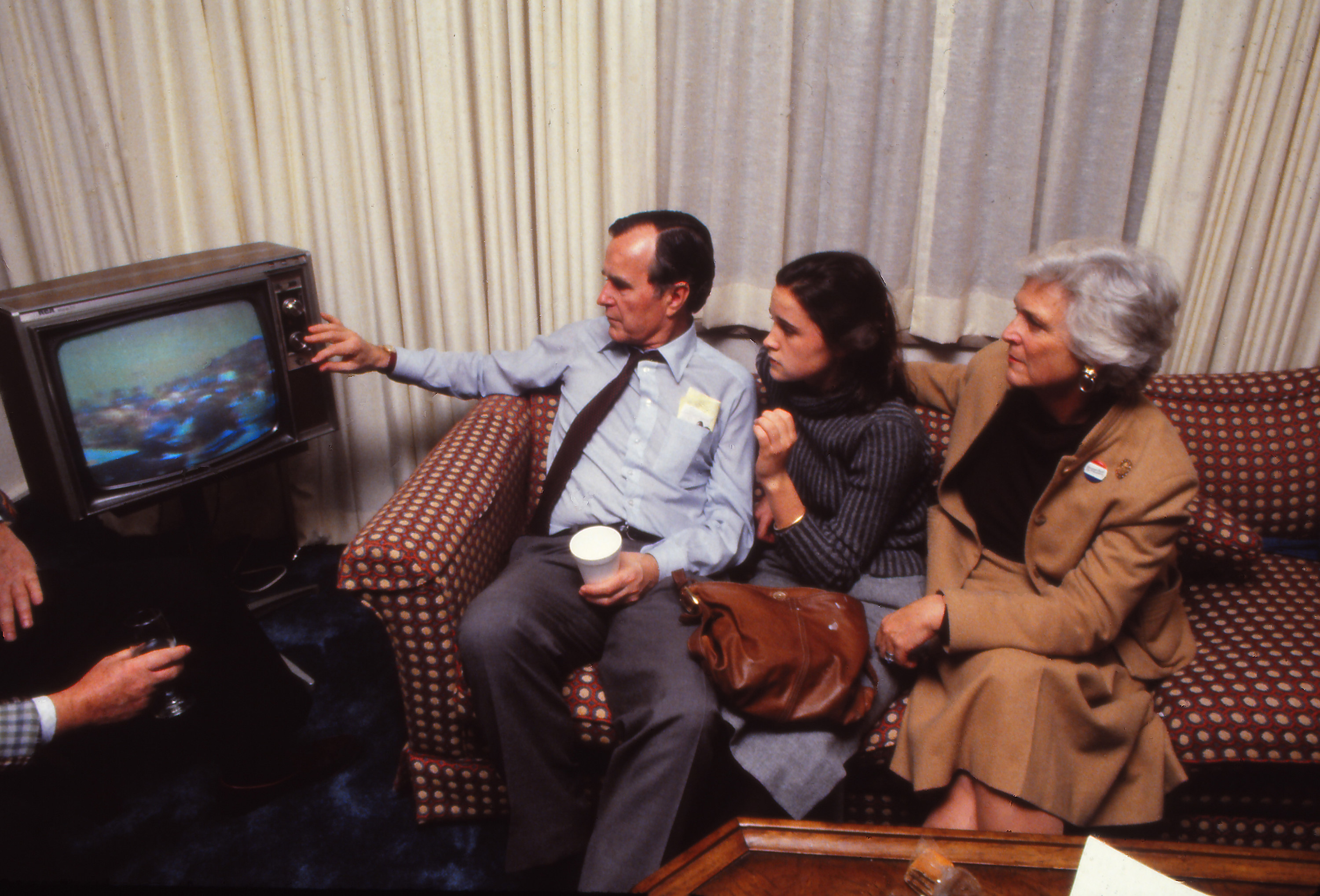 George Bush and family watching television