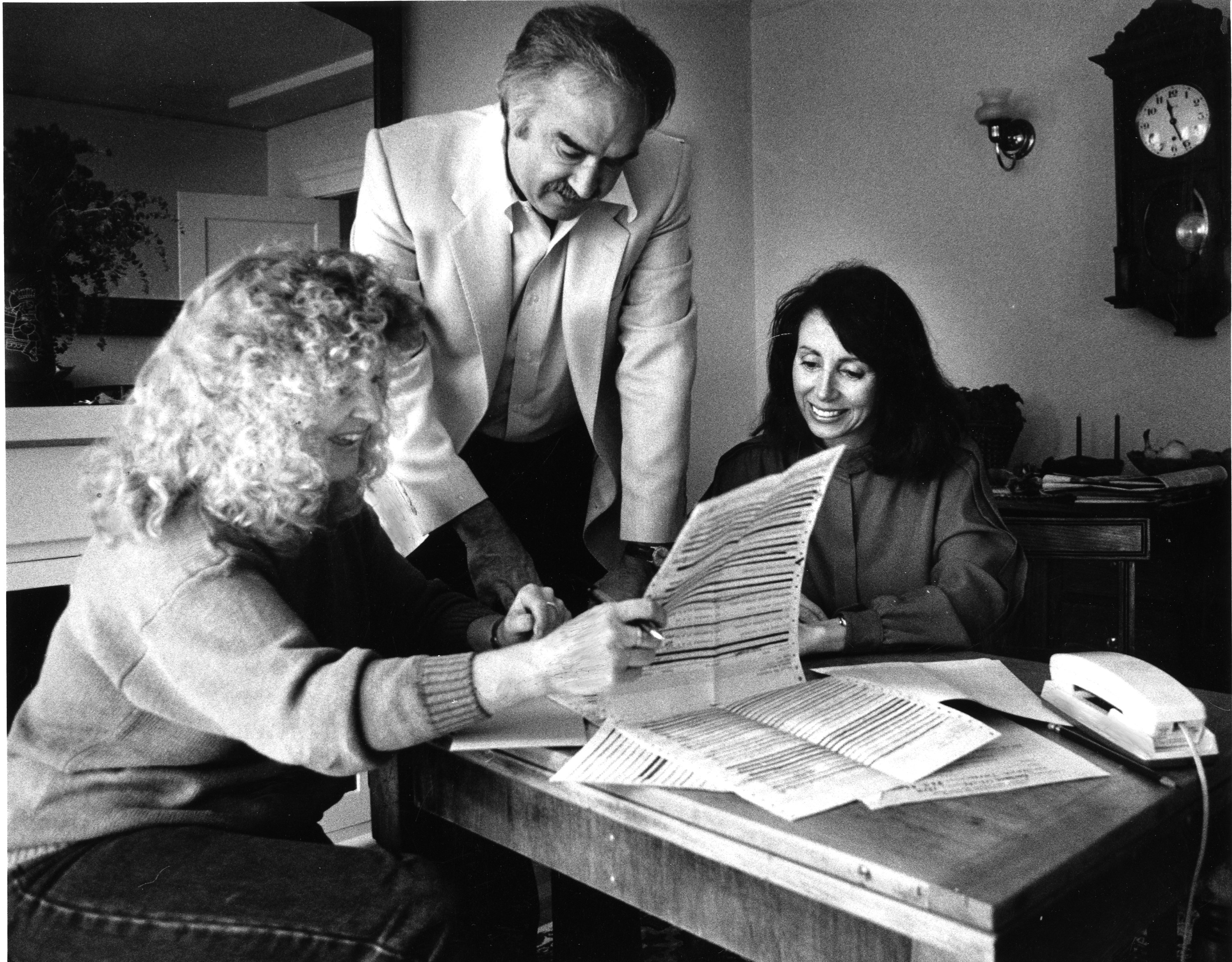 Nancy Pelosi looking over election returns. 