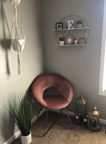 Reviewer pink accent chair in room