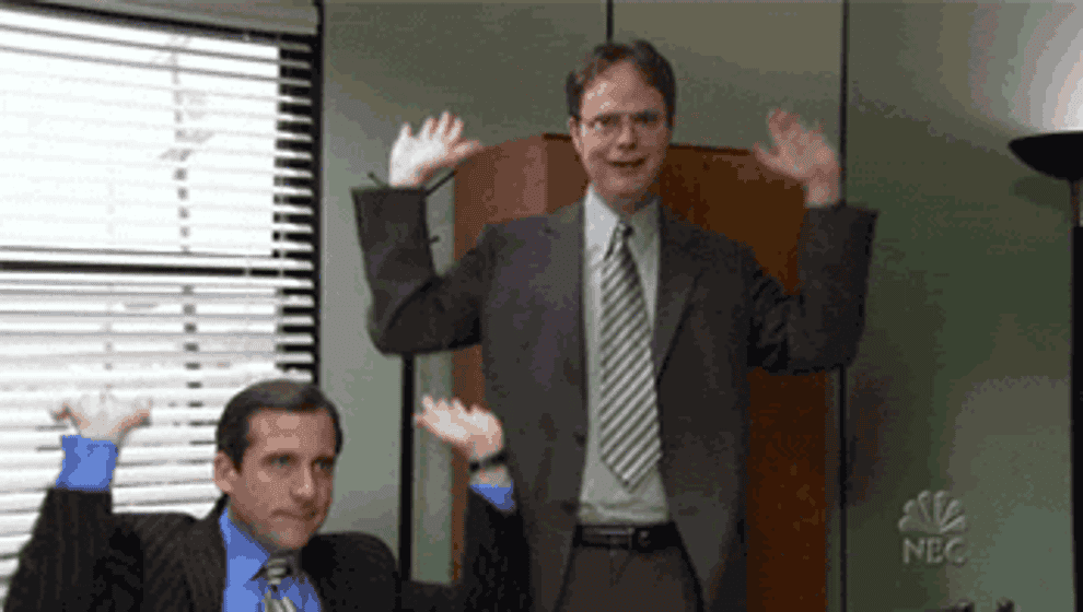 Gif of Michael and Dwight from The Office dancing excitedly 