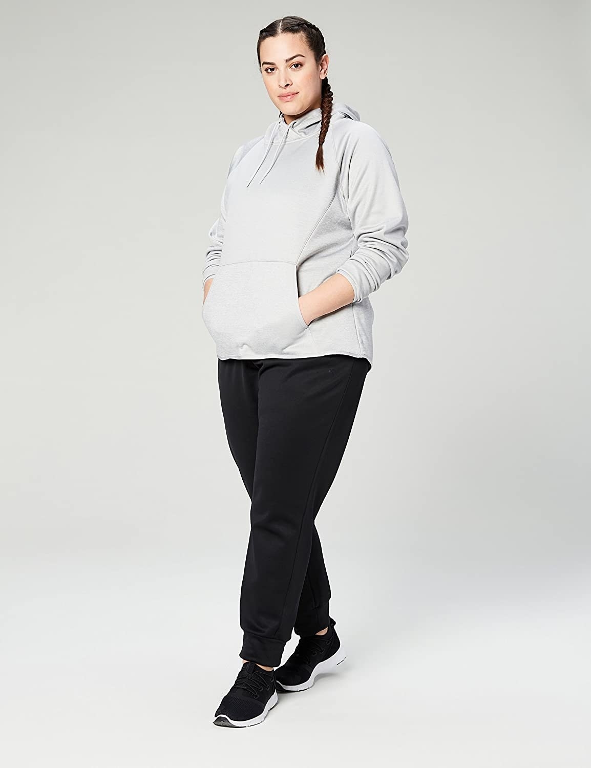 Model wearing grey hoodie