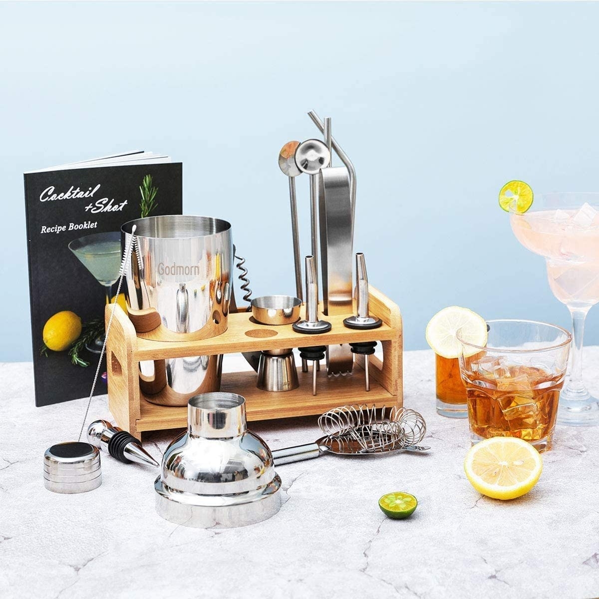 The bartending kit, stand, and several mixed drinks