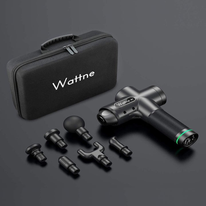 The massage gun, it's attachments, and its carrying case