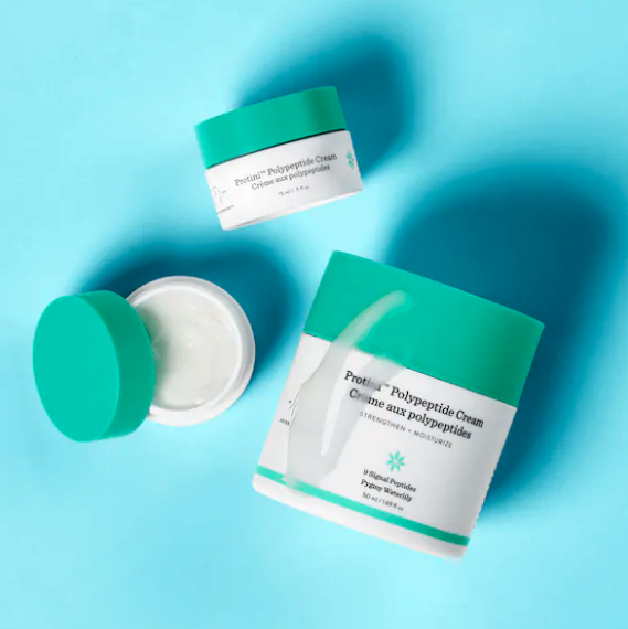 Containers of the moisturizer in various sizes