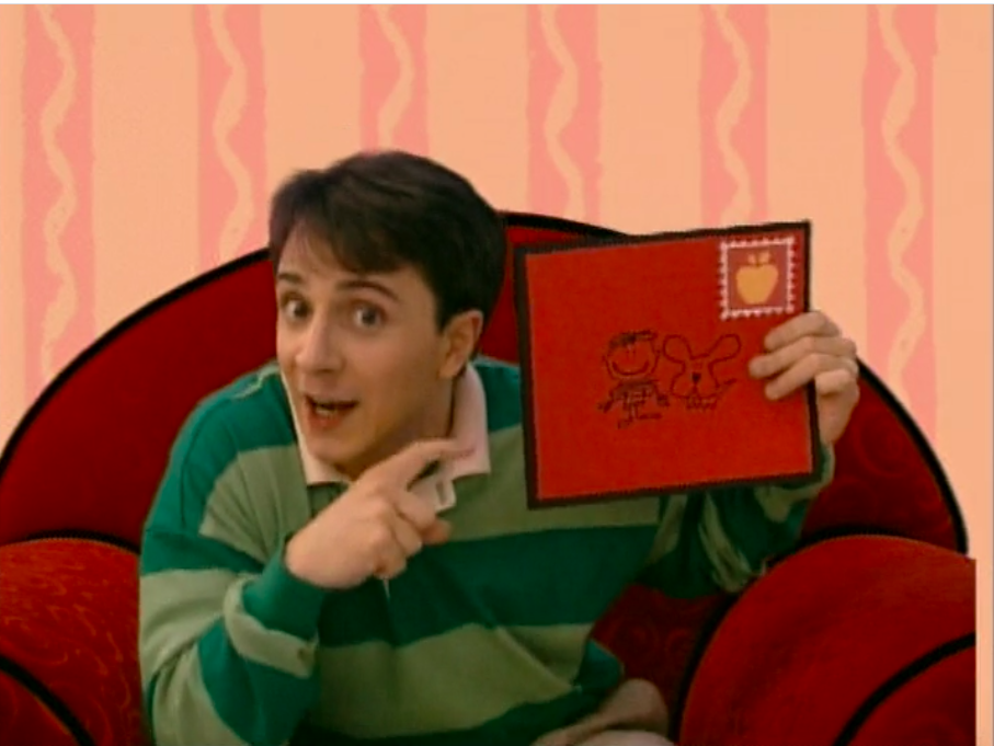 Steve holding a letter