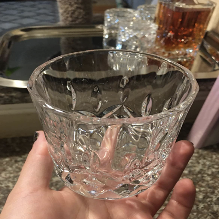 Reviewer photo of glass cup in hand