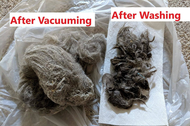 Reviewer photo of a huge pile or fur and dirt that the vacuum sucked up next to another big pile of fur that was removed after using the washing feature