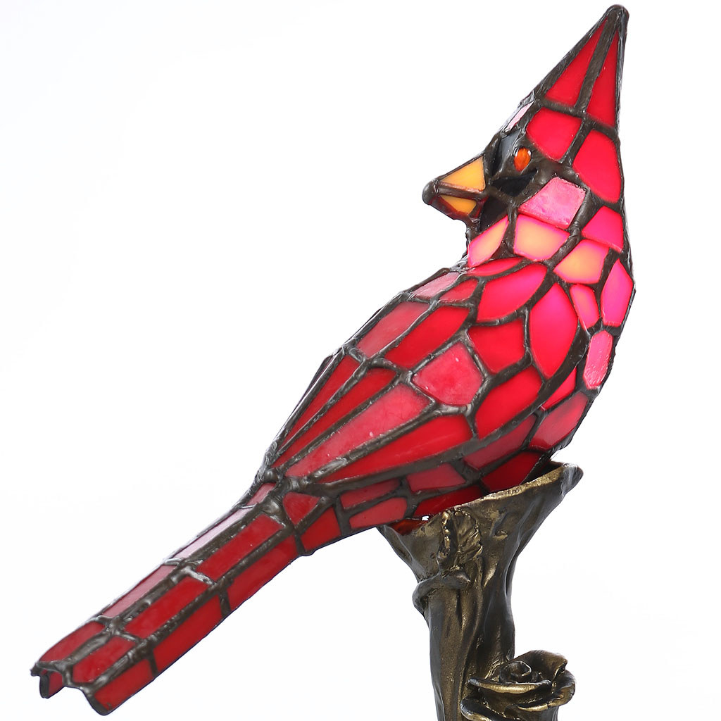 A red bird lamp made of stained glass
