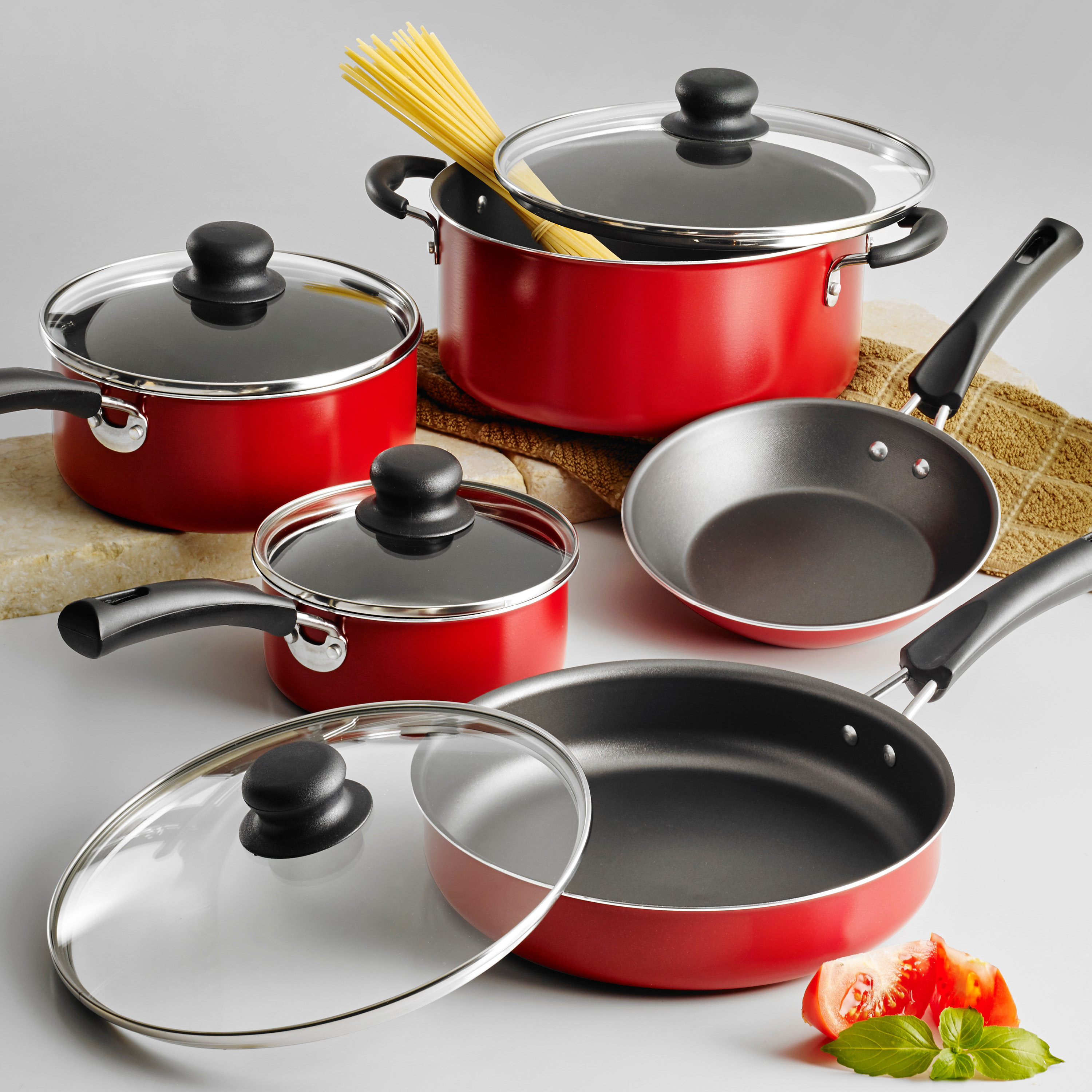The red cookware set on a counter