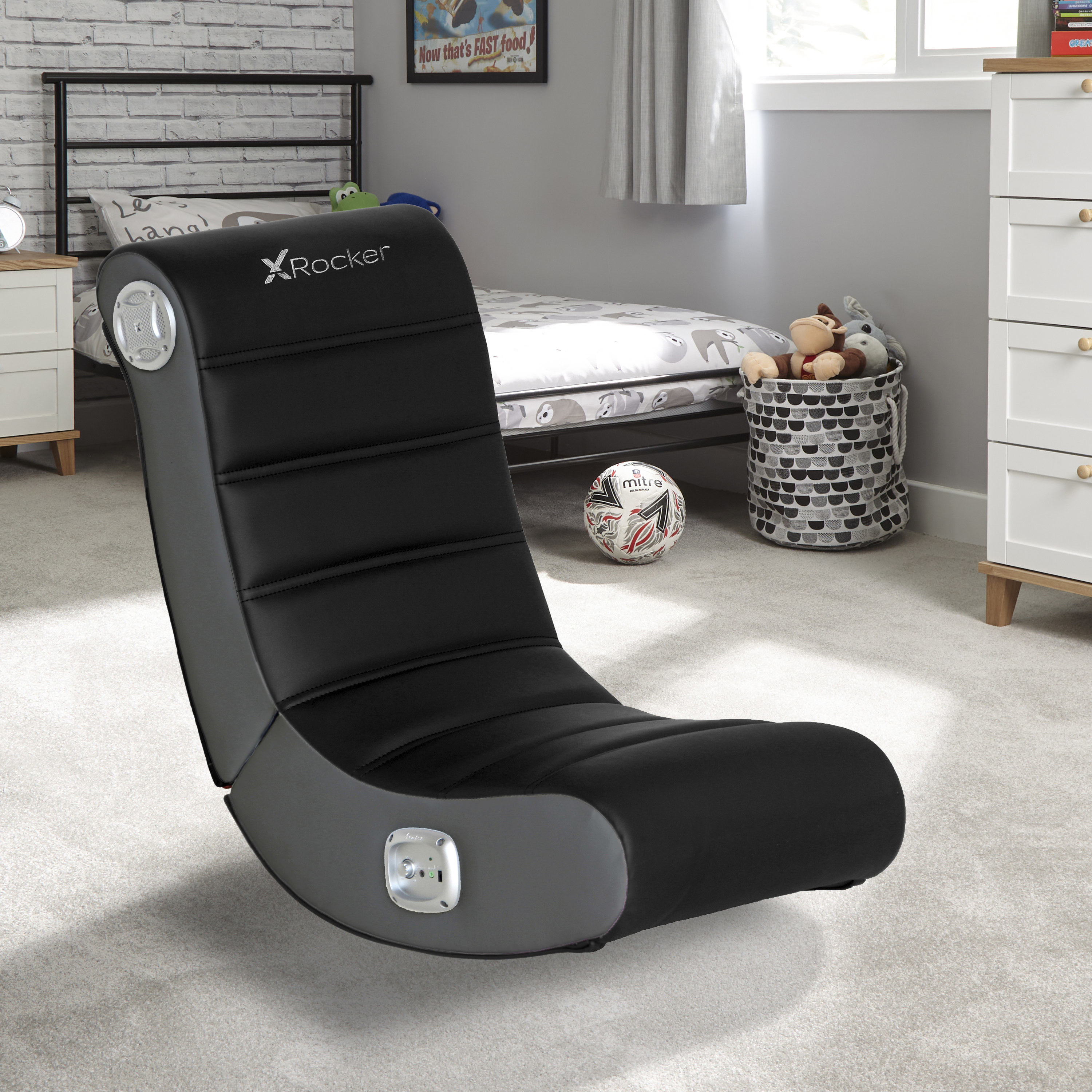 The black gaming chair in a bedroom