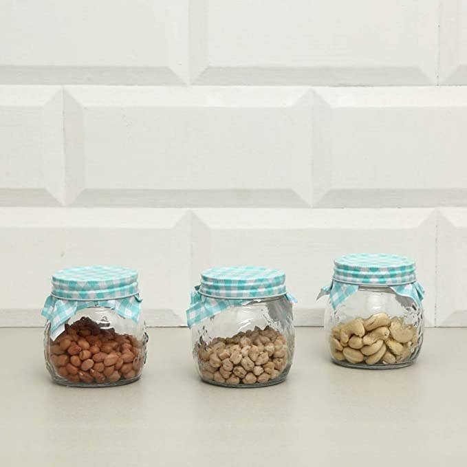 Glass jars with blue checkered lids.