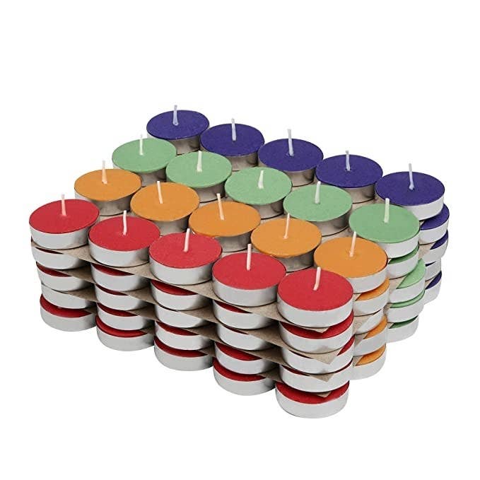 Red, yellow, green and blue tea light candles.