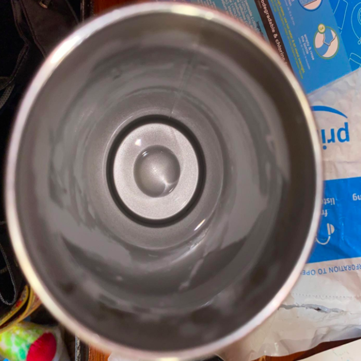 The same reviewer's water bottle now looking shiny and clean after using the cleaning tablet