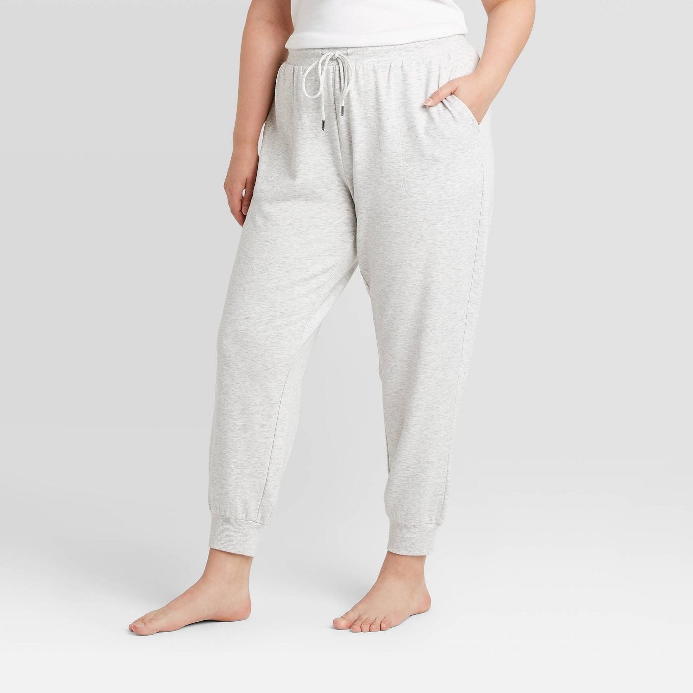 Model in gray jogger sweatpants