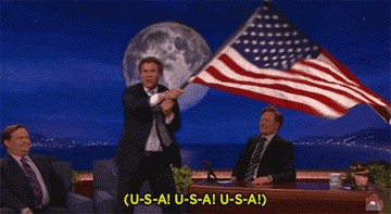 Will Farrell waving a U.S. flag as she says &#x27;U-S-A!&#x27;
