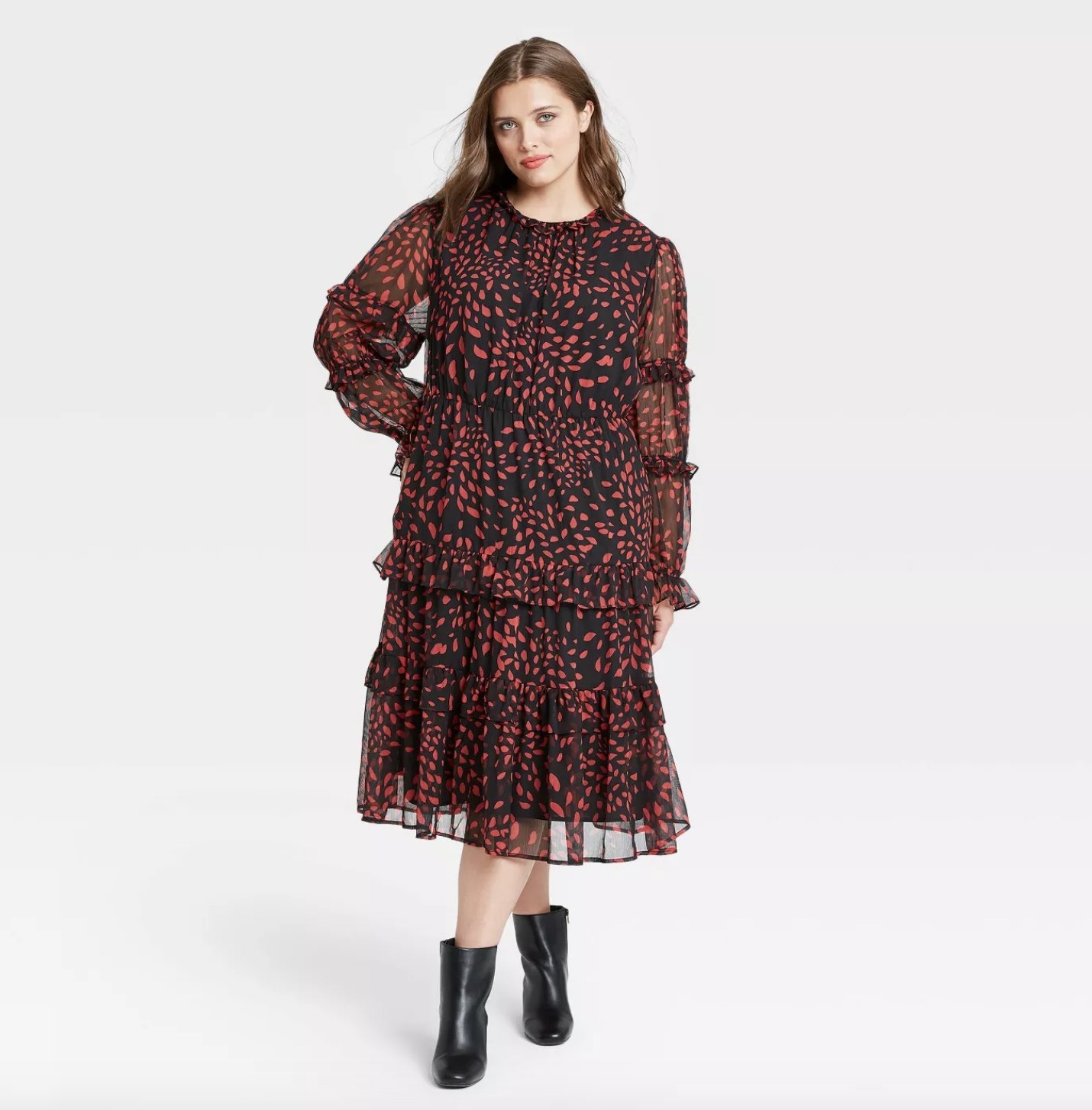 black ruffle dress with red leaf pattern 