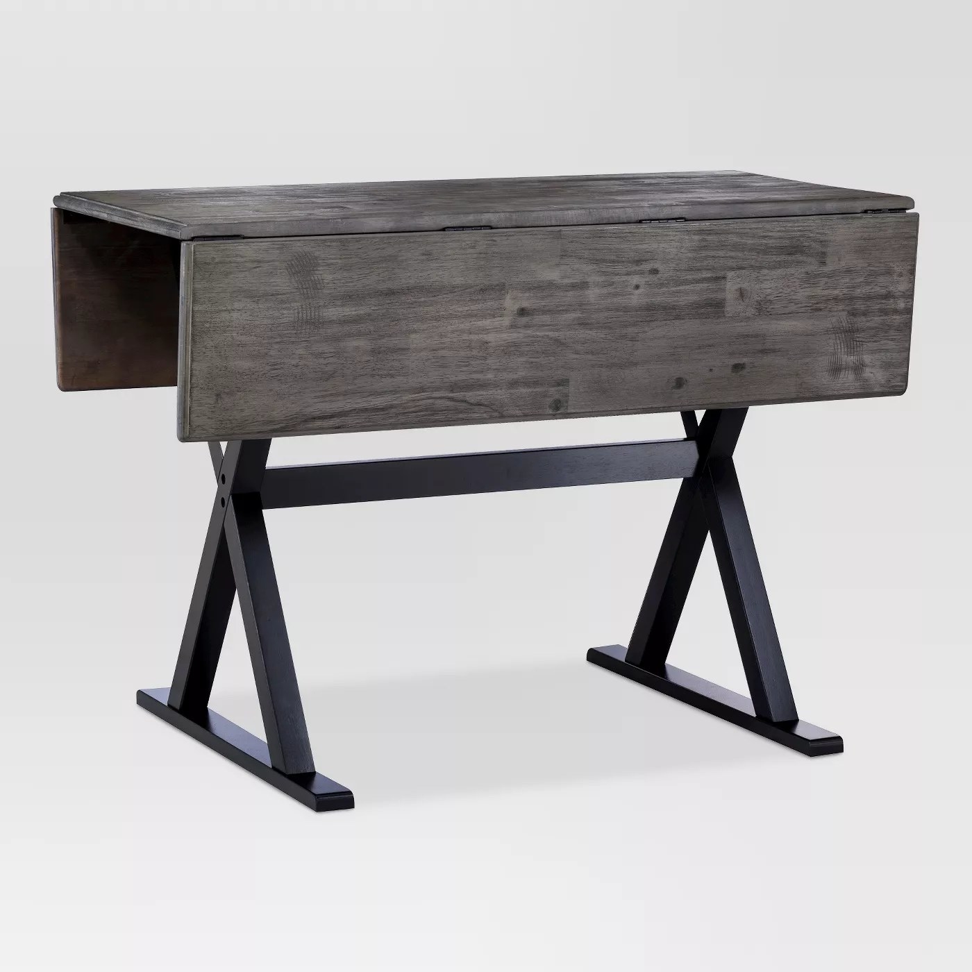 The gray wooden table with metal legs
