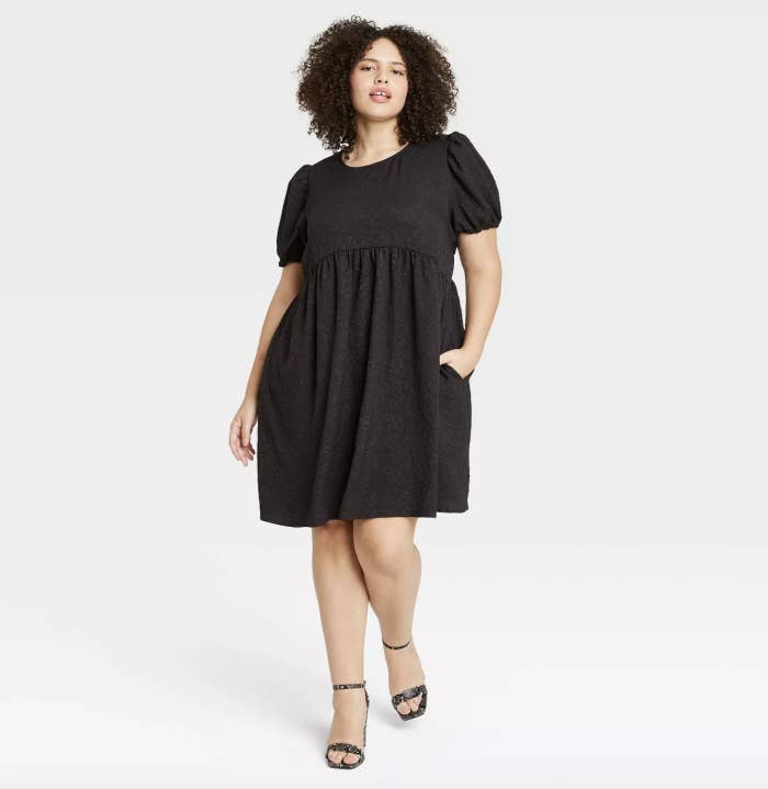 black a-line dress with puff sleeves