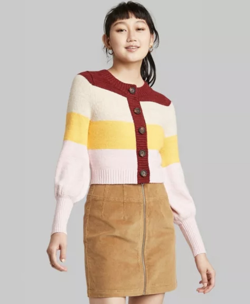 model wears color blocked sweater
