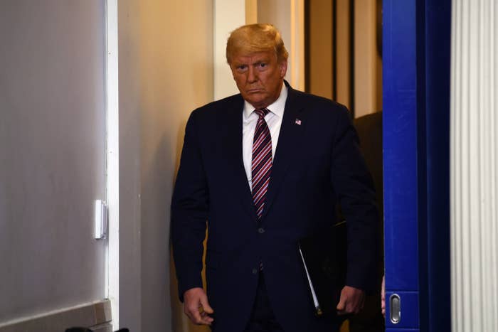 US President Donald Trump arrives in the briefing room