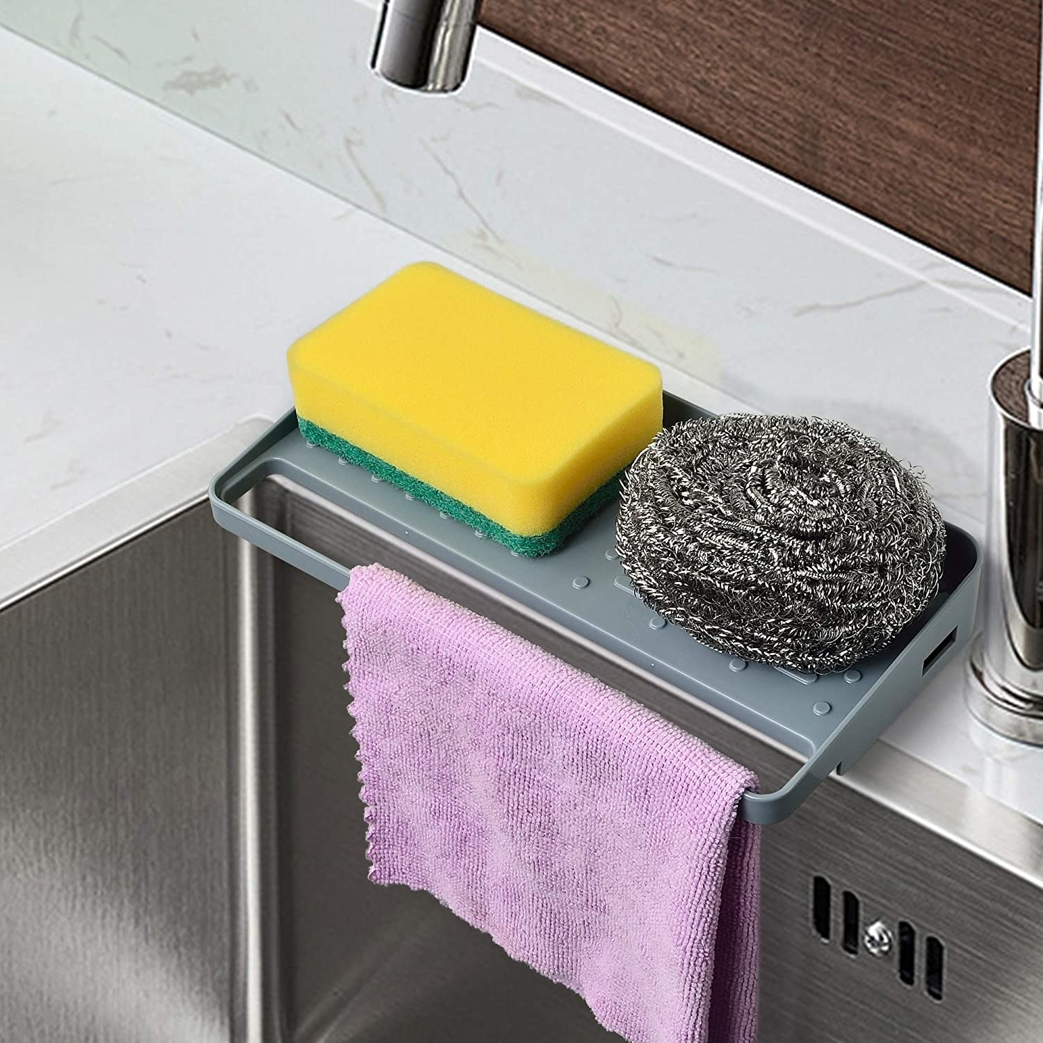 Two sponges and a dishrag on the organizer