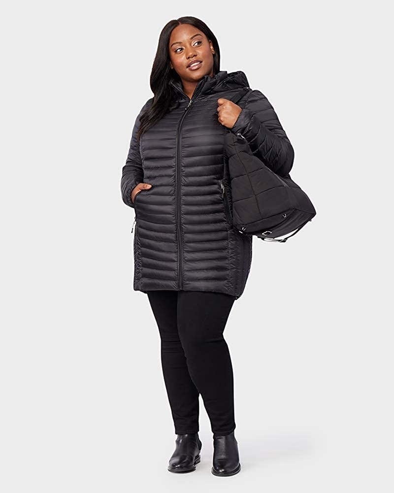 Model in the black quilted jacket with pockets