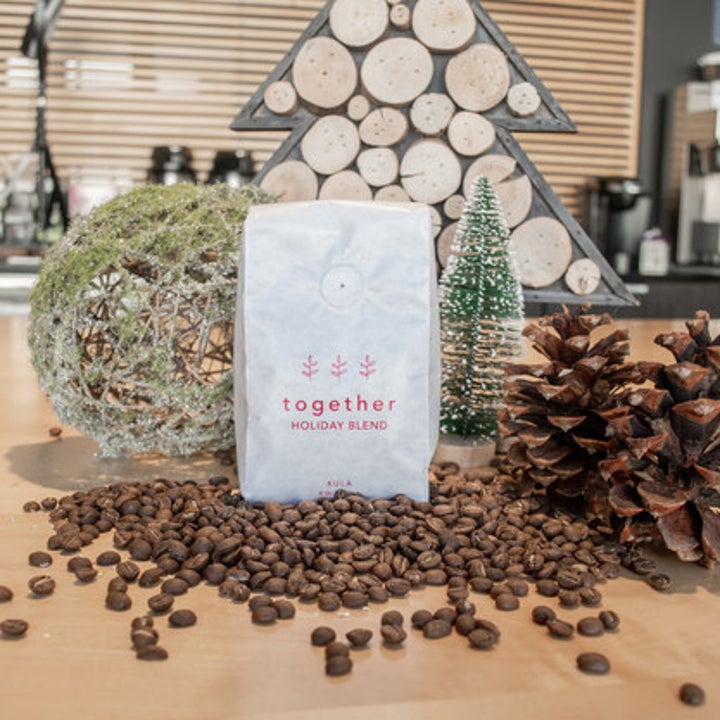 coffee beans with a bag and a festive tree