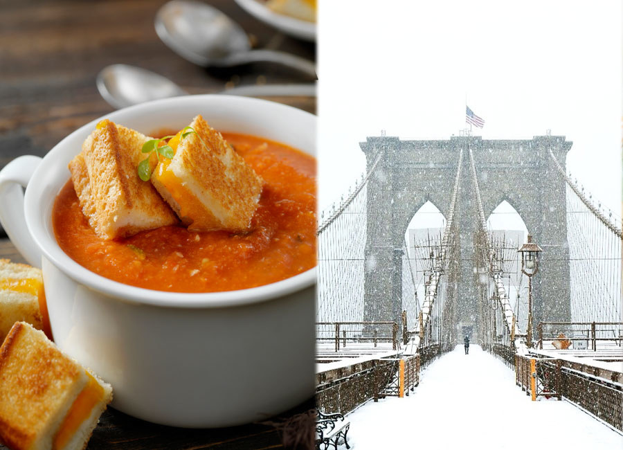 A bowl of tomato soup with grilled cheese croutons and a snowy Brooklyn Bridge.