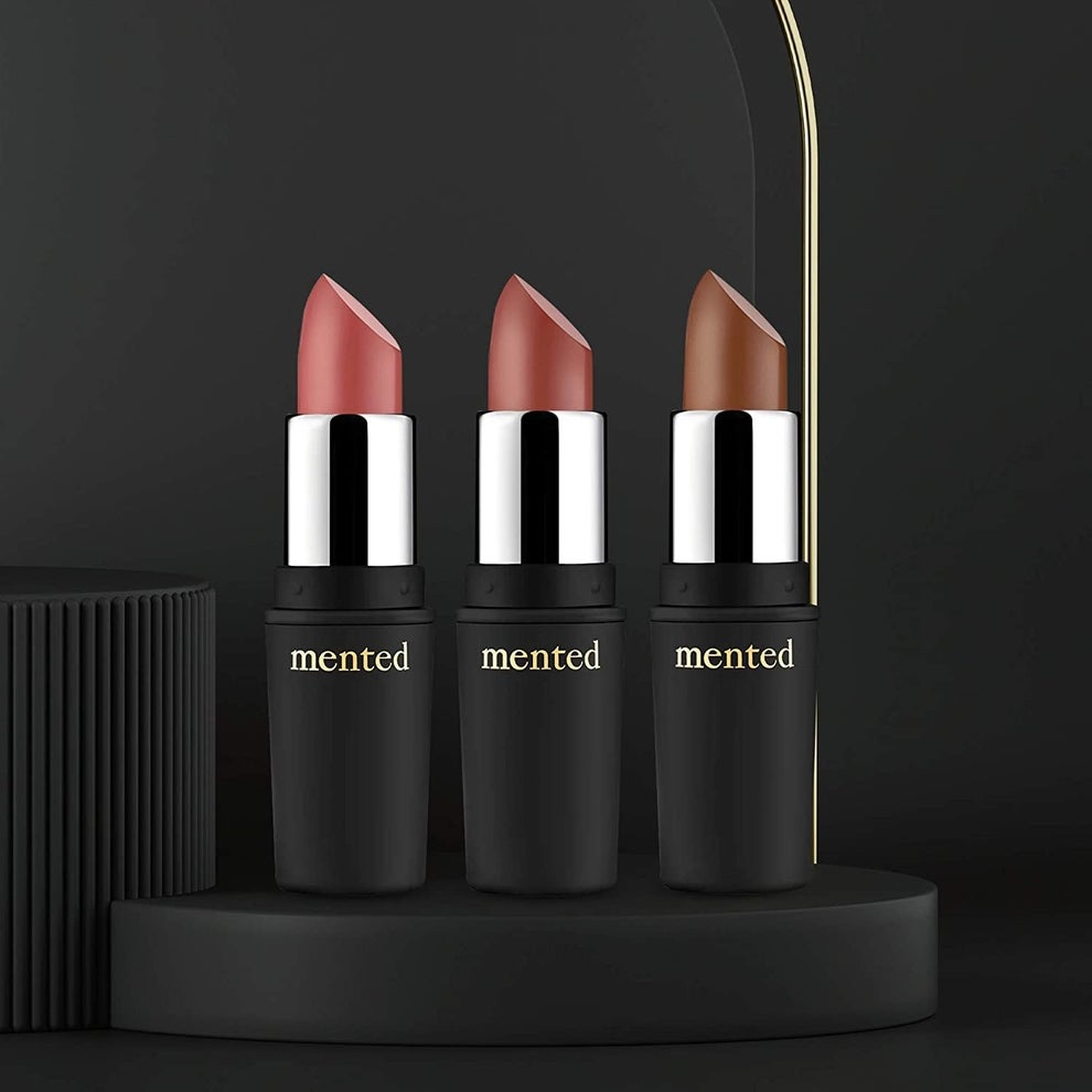 Three Lipsticks With The Tops Off Showing The Different Shades