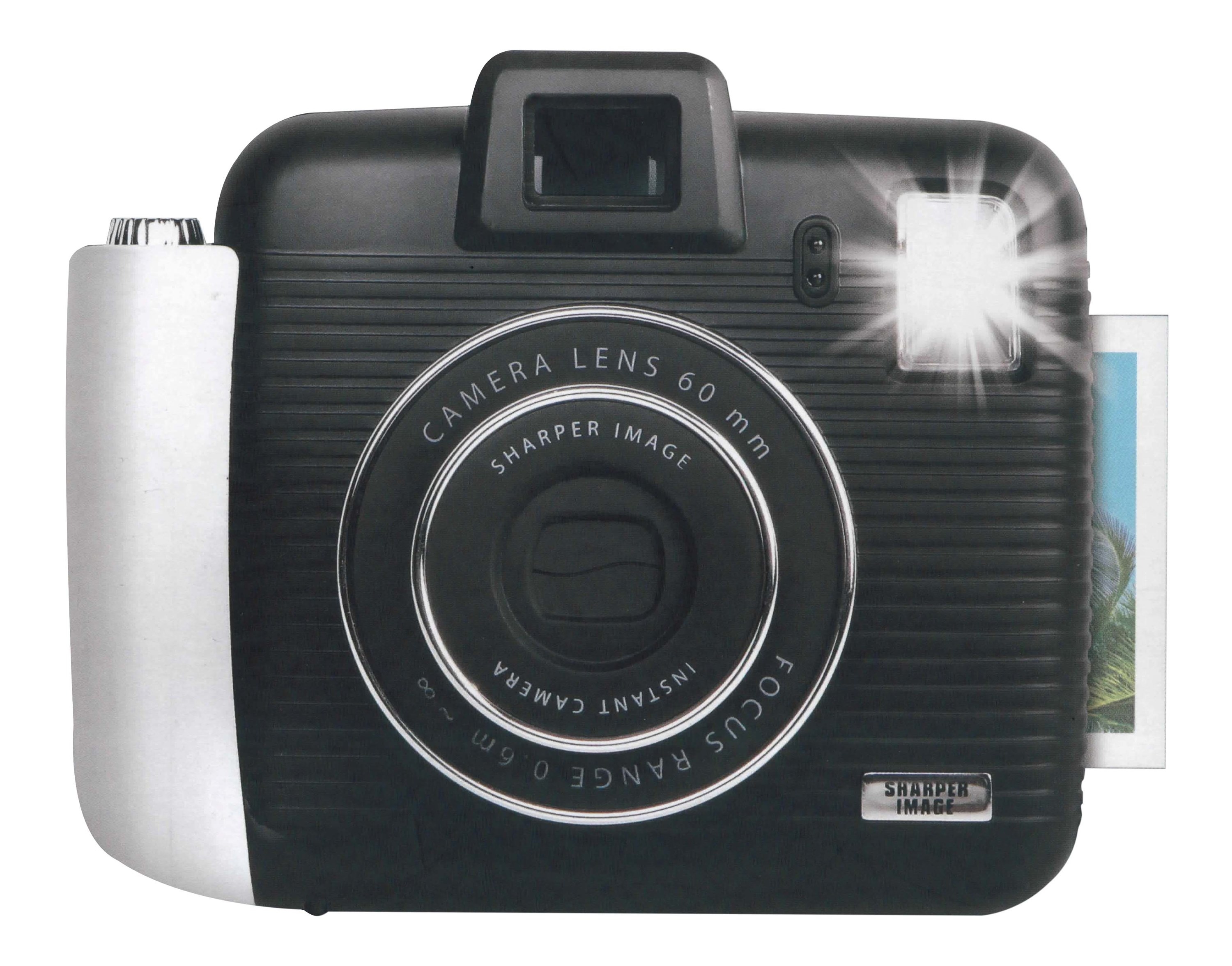The small black and silver camera with an image printing from the side