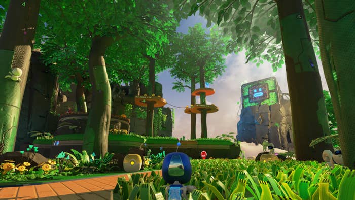 Astro&#x27;s Playroom gameplay showing a small robot green grass and obstacles