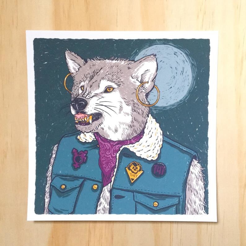 a print of a trans* werewolf wearing earrings, a they/them pin, a t4t pin, and a disabled trans* pride pin