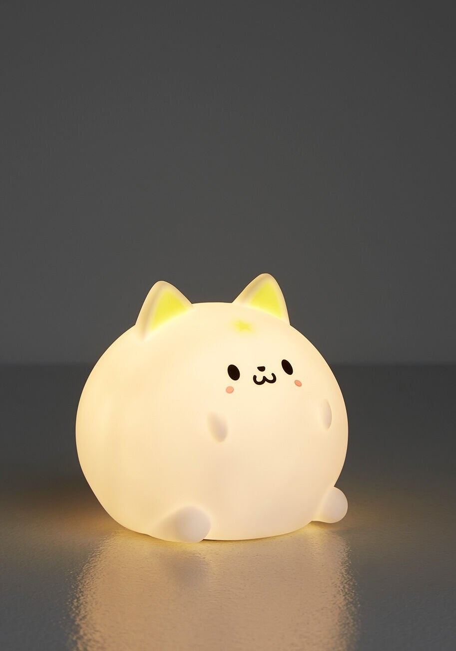a round, cat-like night light