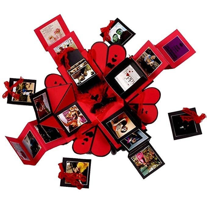 Red and black explosion box filled with pictures.