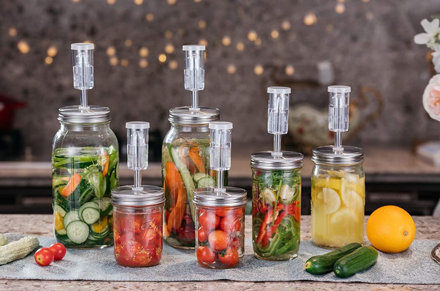 Jars with the lids with fermenting foods inside