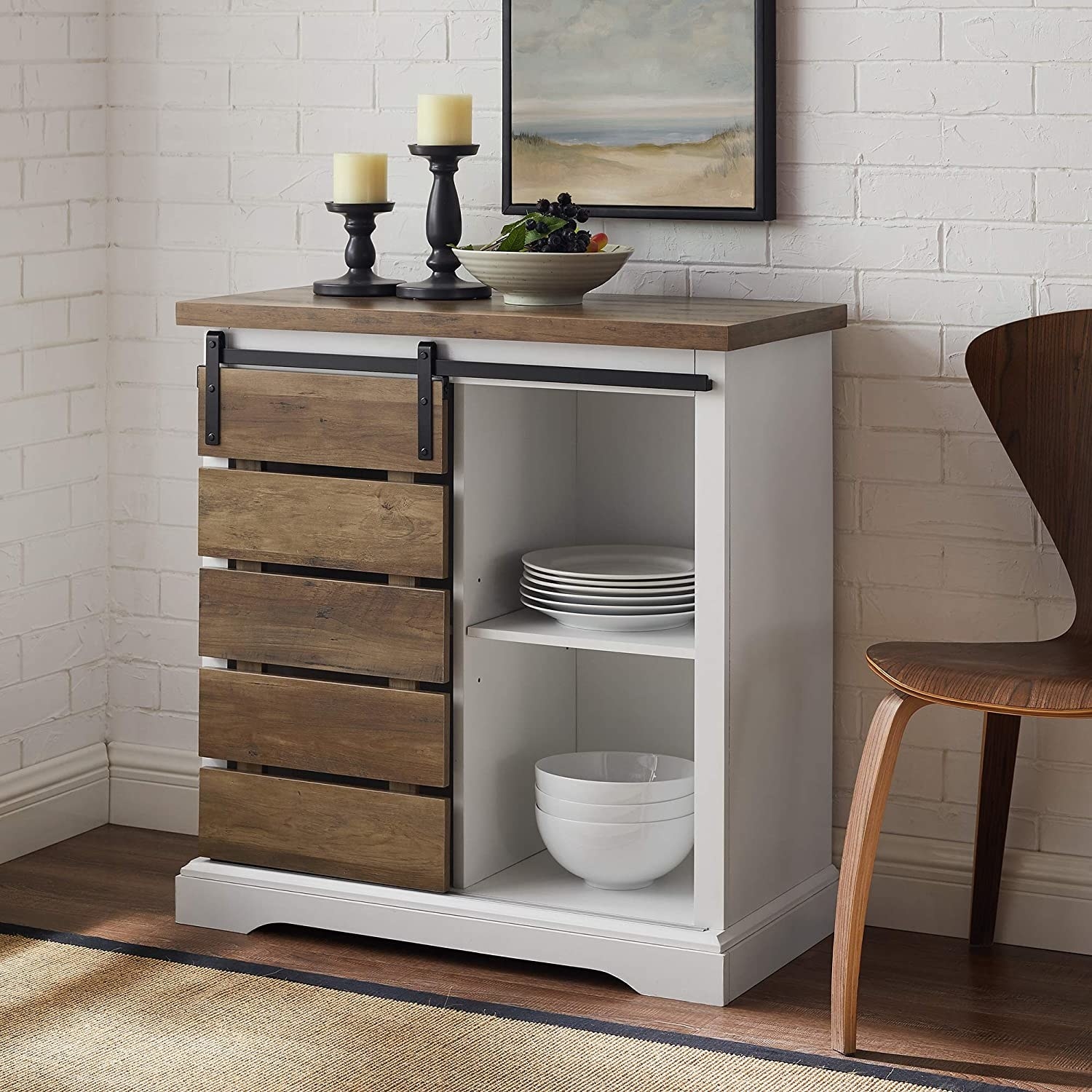 The white buffet with a dark wooden sliding door