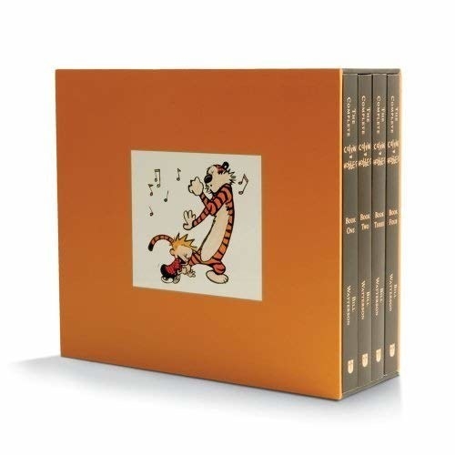 orange box with calvin and hobbes dancing and four volumes inside 