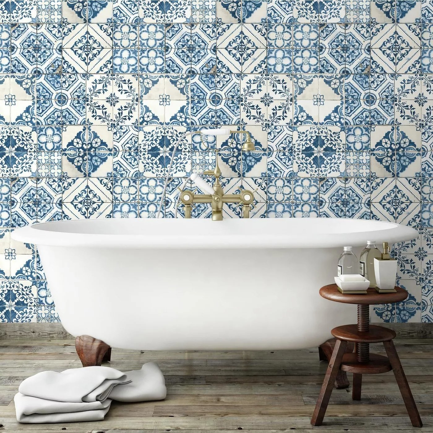 The blue and white wallpaper in a bathroom