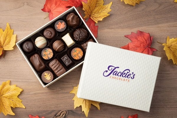 a box of autumn-themed chocolates 