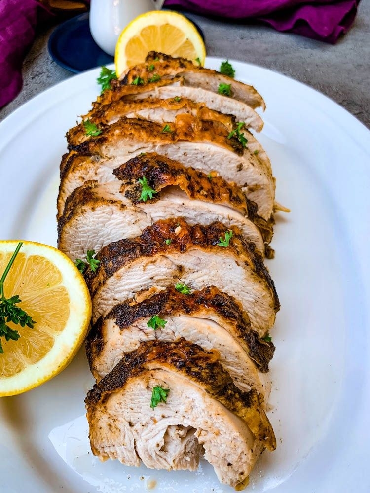 A turkey breast cooked in the air fryer and sliced.